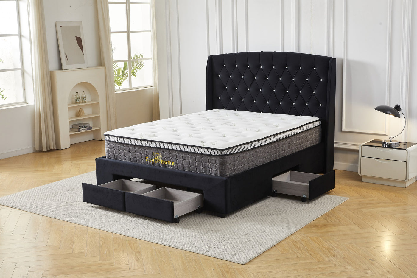 Black four-drawer tufted bed frame and bamboo mattress package, angled view with drawers open