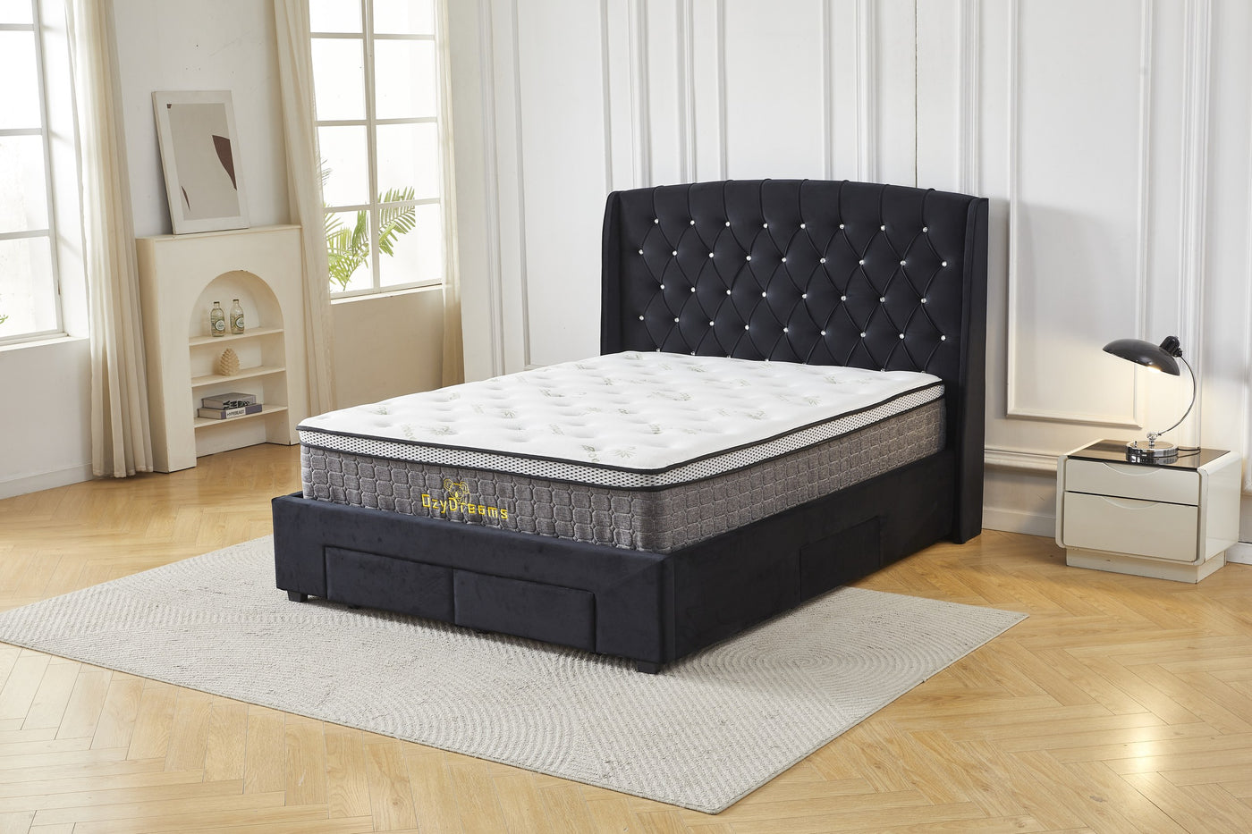 Black tufted four-drawer bed frame and bamboo mattress package, angled front view