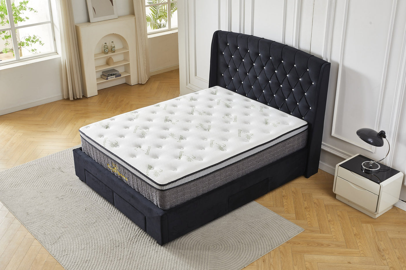 Black tufted four-drawer bed frame and bamboo mattress package, elevated angled view
