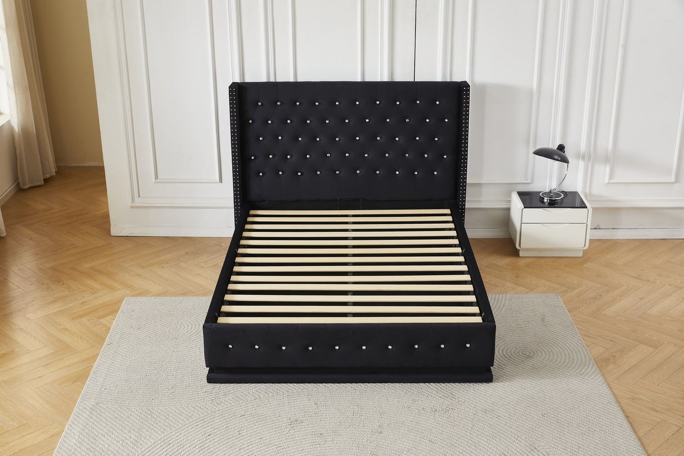Black crystal tufted gas lift storage bed frame, straight front view