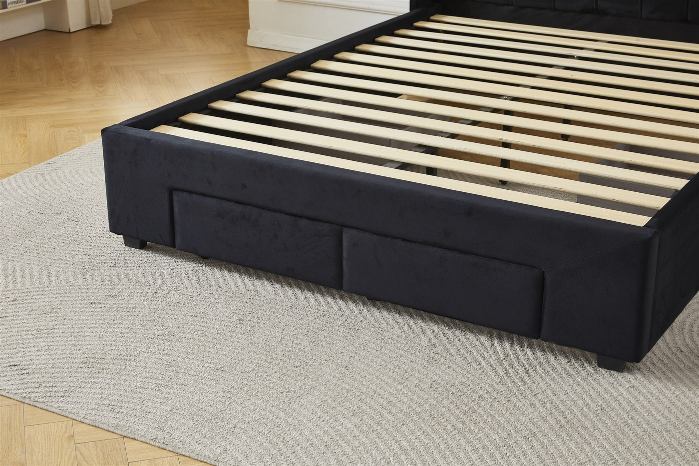 Black upholstered footboard detail