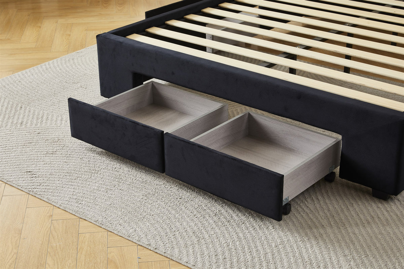 Black bed frame front drawer storage detail
