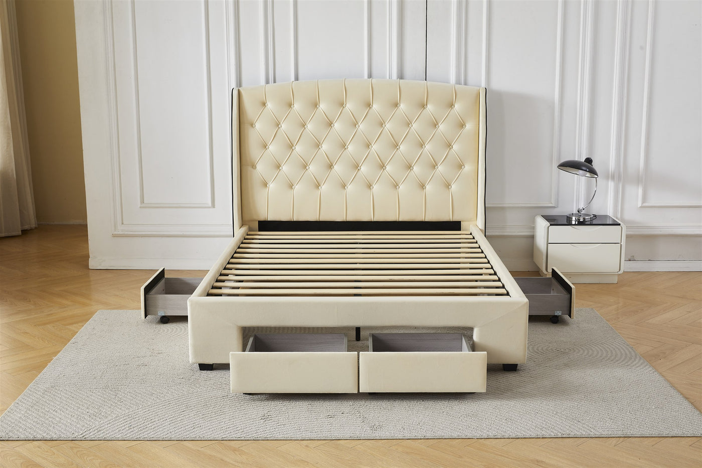 Cream tufted bed frame with four drawers open