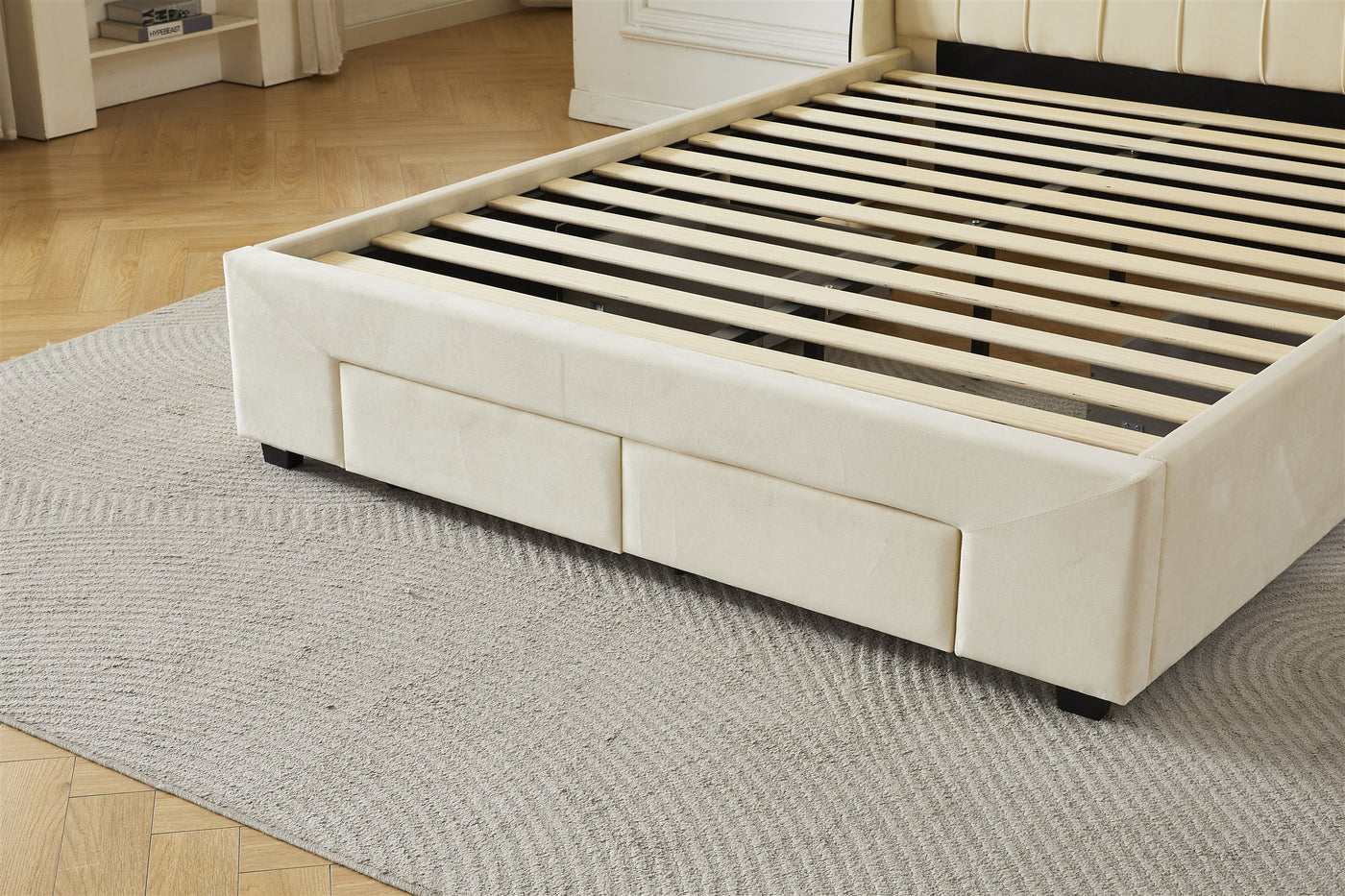 Cream upholstered footboard detail