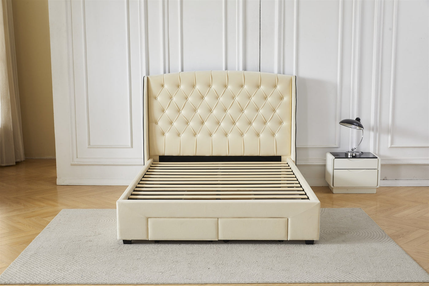 Cream tufted bed frame with drawers, front view