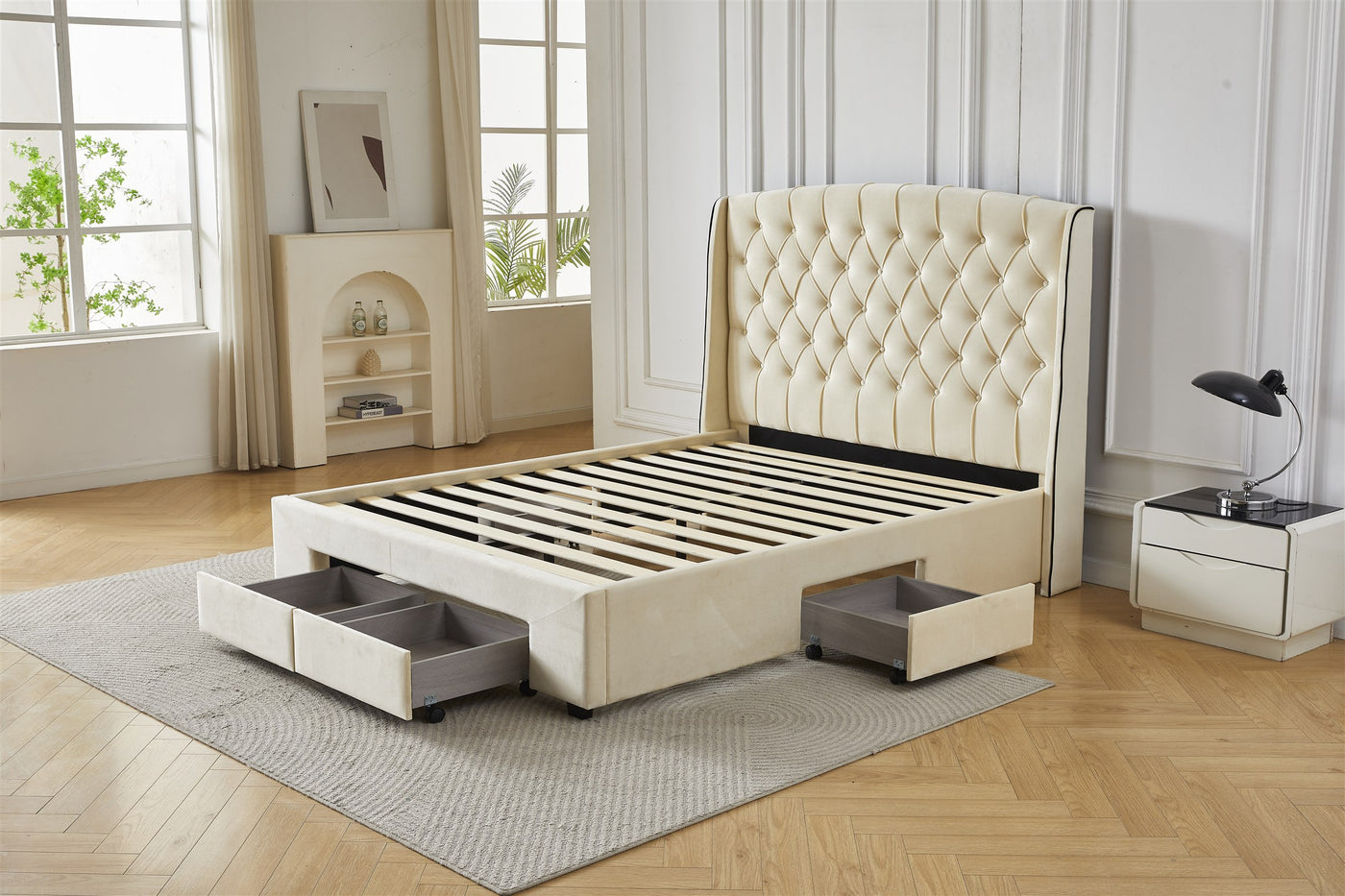 Cream tufted bed frame with drawers open, angled front view